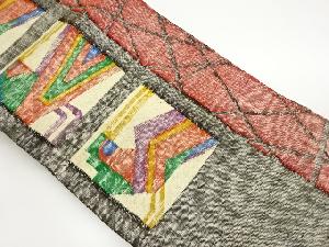 手織り真綿紬色紙に抽象模様織出し名古屋帯